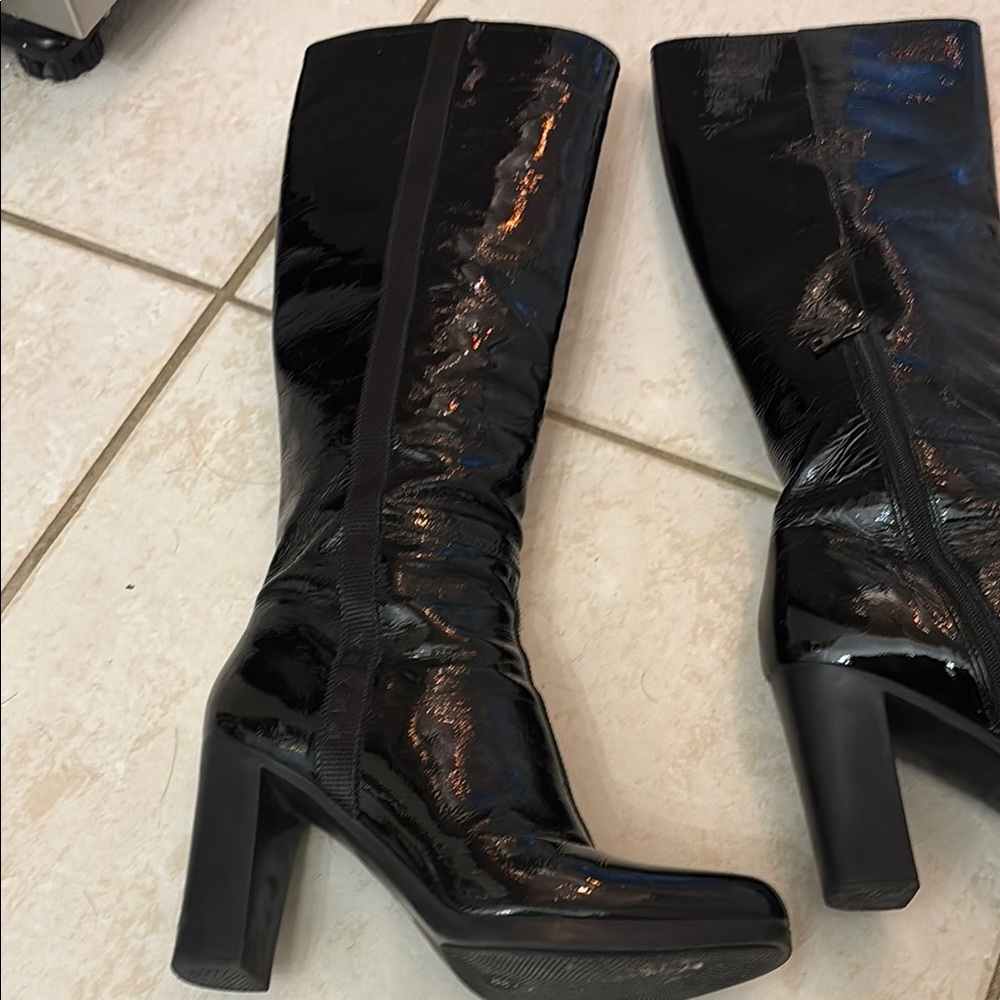 Prada super sexy black boots.  Perfect condition